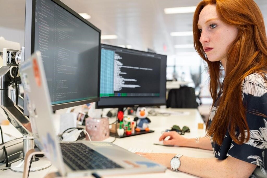 A woman in an office studying AI knowledge management