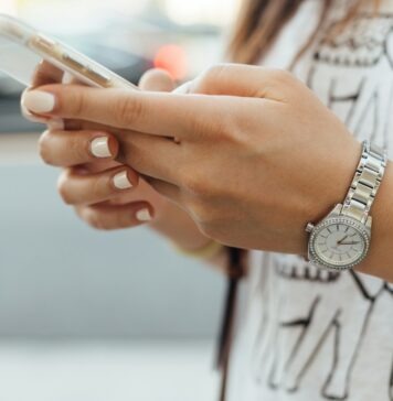 Live Dealer Casino Technology Brings Authentic Thrills Home woman holding iPhone during daytime