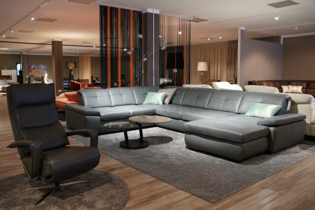 Photo by Albero Furniture Bratislava a living room filled with furniture and a wooden floor