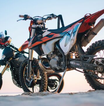 Creative Business Branding: Redefining Business Identity through Customized Bike Graphics selective focus photography of two white and black dual-sport motorcycles