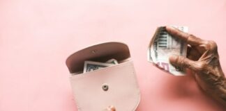 Maximizing Senior Savings: Benefits of Opening a Senior Citizen Savings Account Online brown leather hand bag on pink table