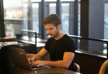 How to use odds in Aviator Game man in black crew neck t-shirt using macbook