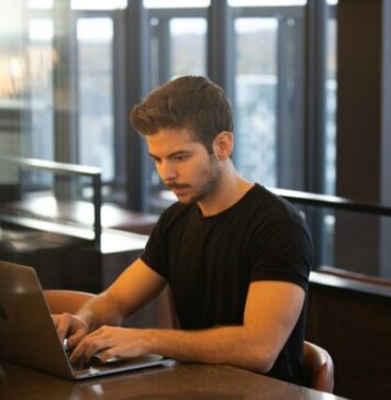 How to use odds in Aviator Game man in black crew neck t-shirt using macbook