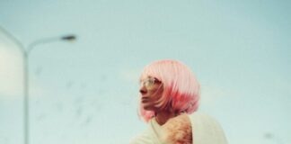 The Ultimate Guide to Caring for Your Luxury Bob Wig woman looking sideways near light post