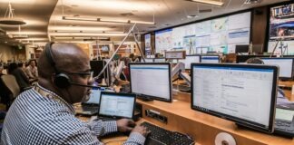 Enhancing Operational Efficiency with Advanced Process Mining Tools man in black and white checkered dress shirt using computer