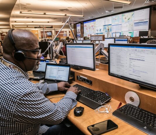 Enhancing Operational Efficiency with Advanced Process Mining Tools man in black and white checkered dress shirt using computer