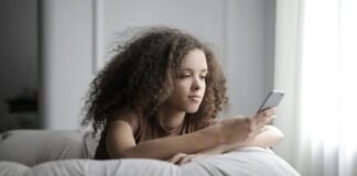 How Pussy88 Keeps Your Login Secure: A Look at Their Security Protocols Photo of Woman Sitting on a Gray Bean Bag While Using Her Phone