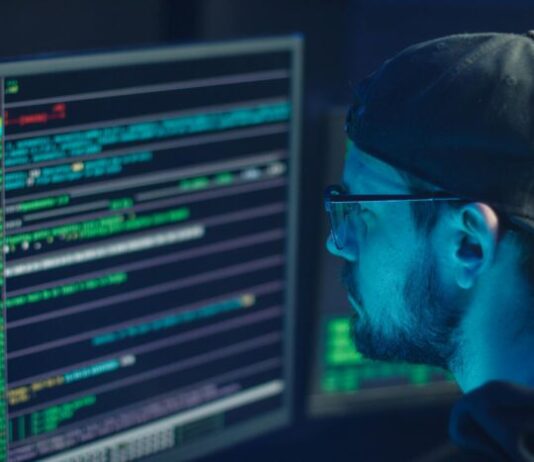 CISO Advisory: A Key to Navigating Cyber Threats in a Digital World Man in Blue Crew Neck Shirt Wearing Black Framed Eyeglasses