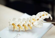 The Connection Between Chiropractic Care and Better Sleep Quality white spiral paper on black surface